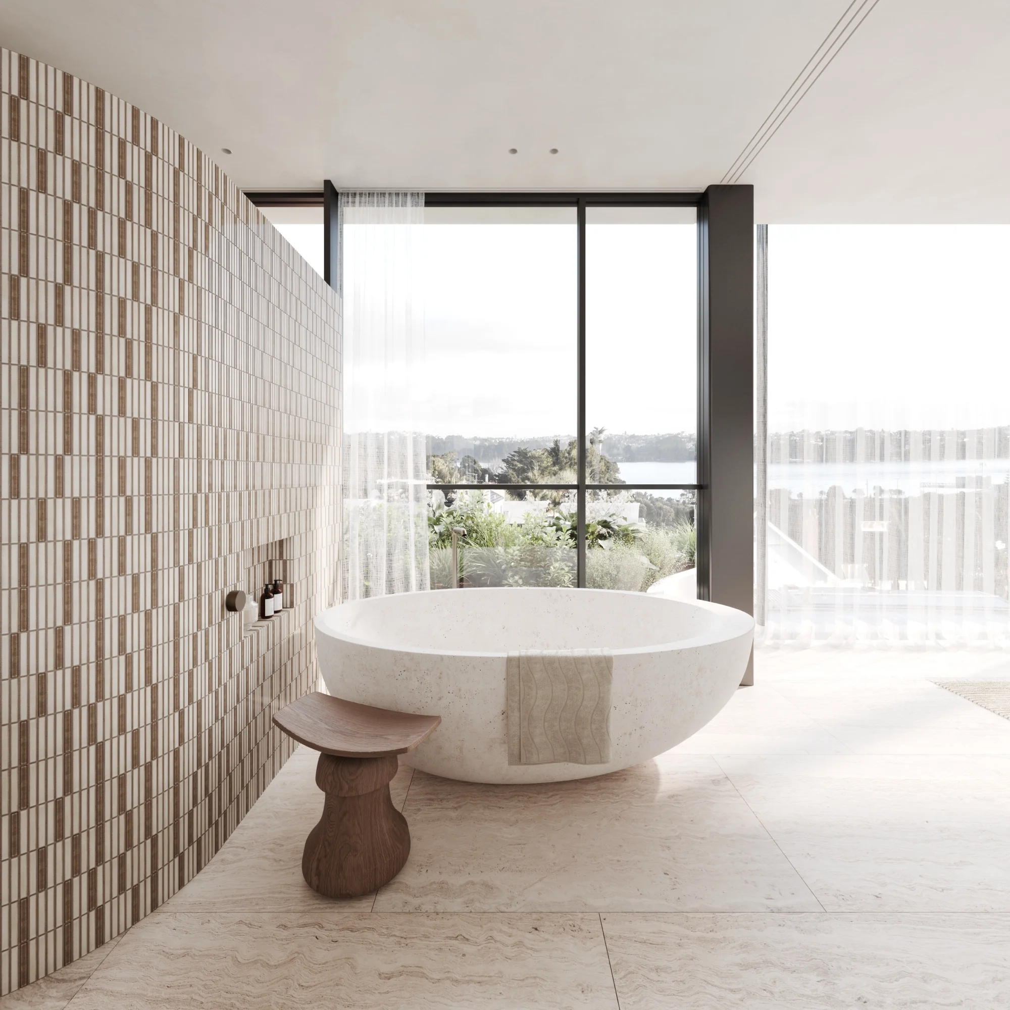 Ensuite with freestanding stone bath and harbour outlook